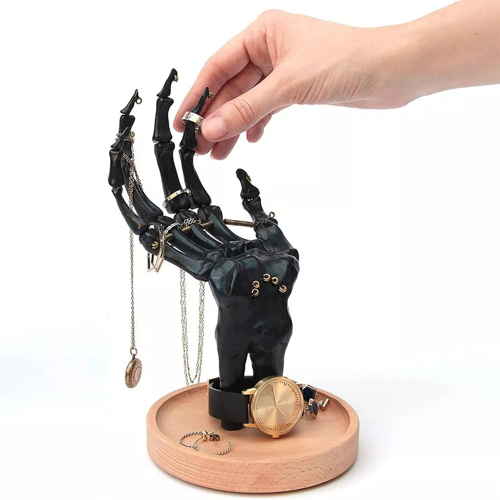 Rangement à bijoux à main squelette noir