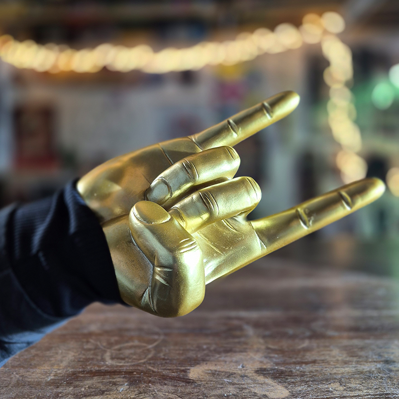 Support pour casque doré