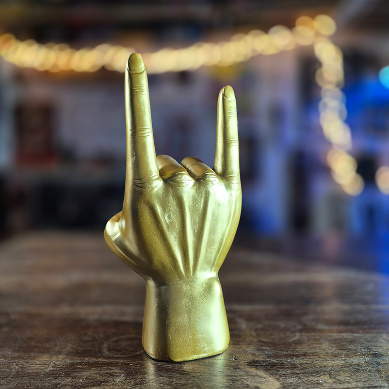 Support pour casque doré